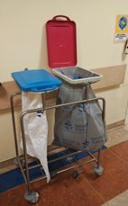 A garbage can on a cart

AI-generated content may be incorrect.